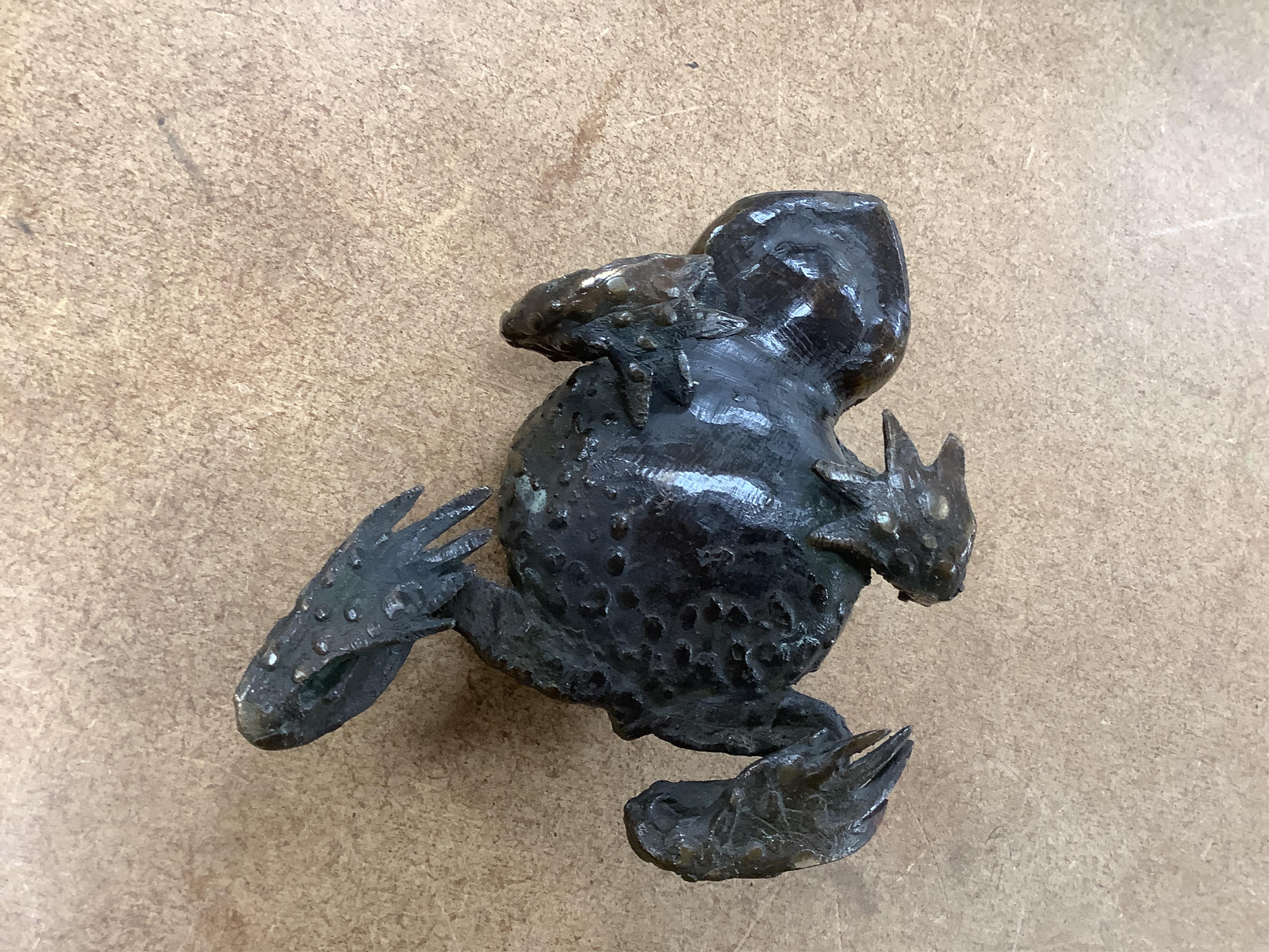 Pierre Chenet foundry (modern), a bronze model of a frog, together with an unsigned bronze model of a toad, largest 12cm. Condition - fair